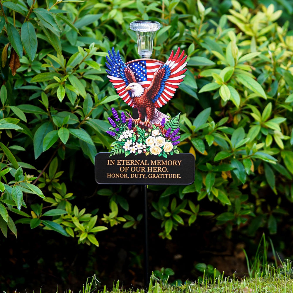 VKEVOC Solar Eagle Memorial Stake beside a headstone