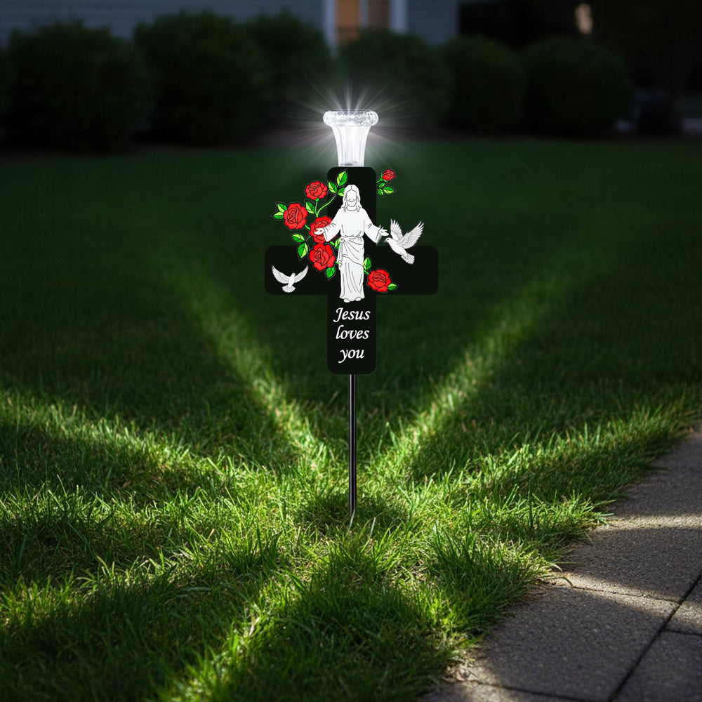 VKEVOC Solar Jesus Cross Memorial Stake in garden