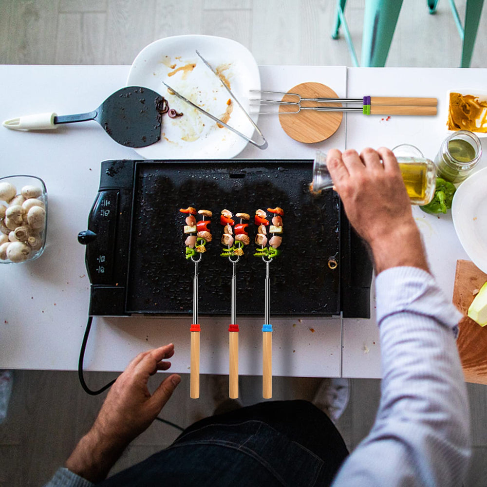 VOPTON marshmallow roasting sticks displayed next to s'mores ingredients