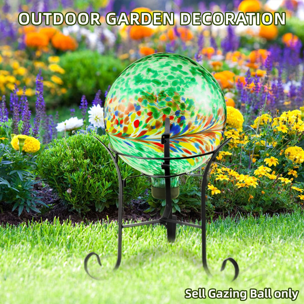 VOREEN gazing ball displayed in a garden setting