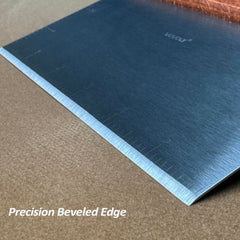 Vovoly Bench Scraper in use on a flat top griddle