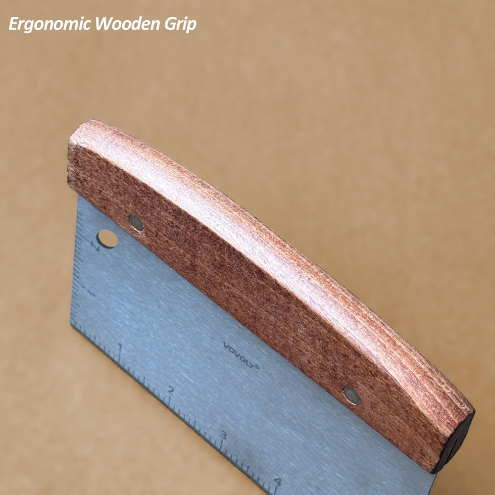 Vovoly Bench Scraper with dough on a wooden surface