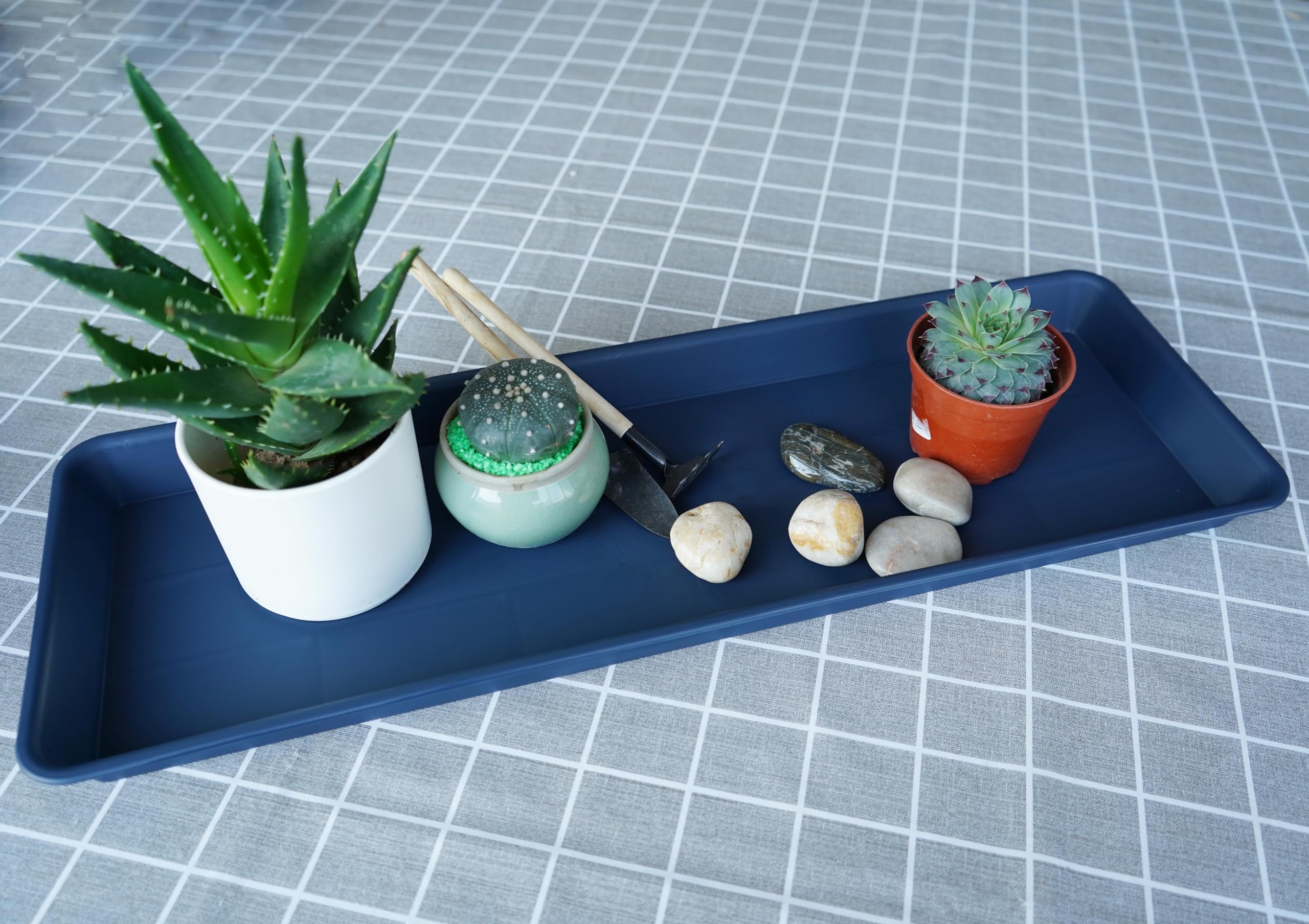 VUWEZ plant trays stacked for storage