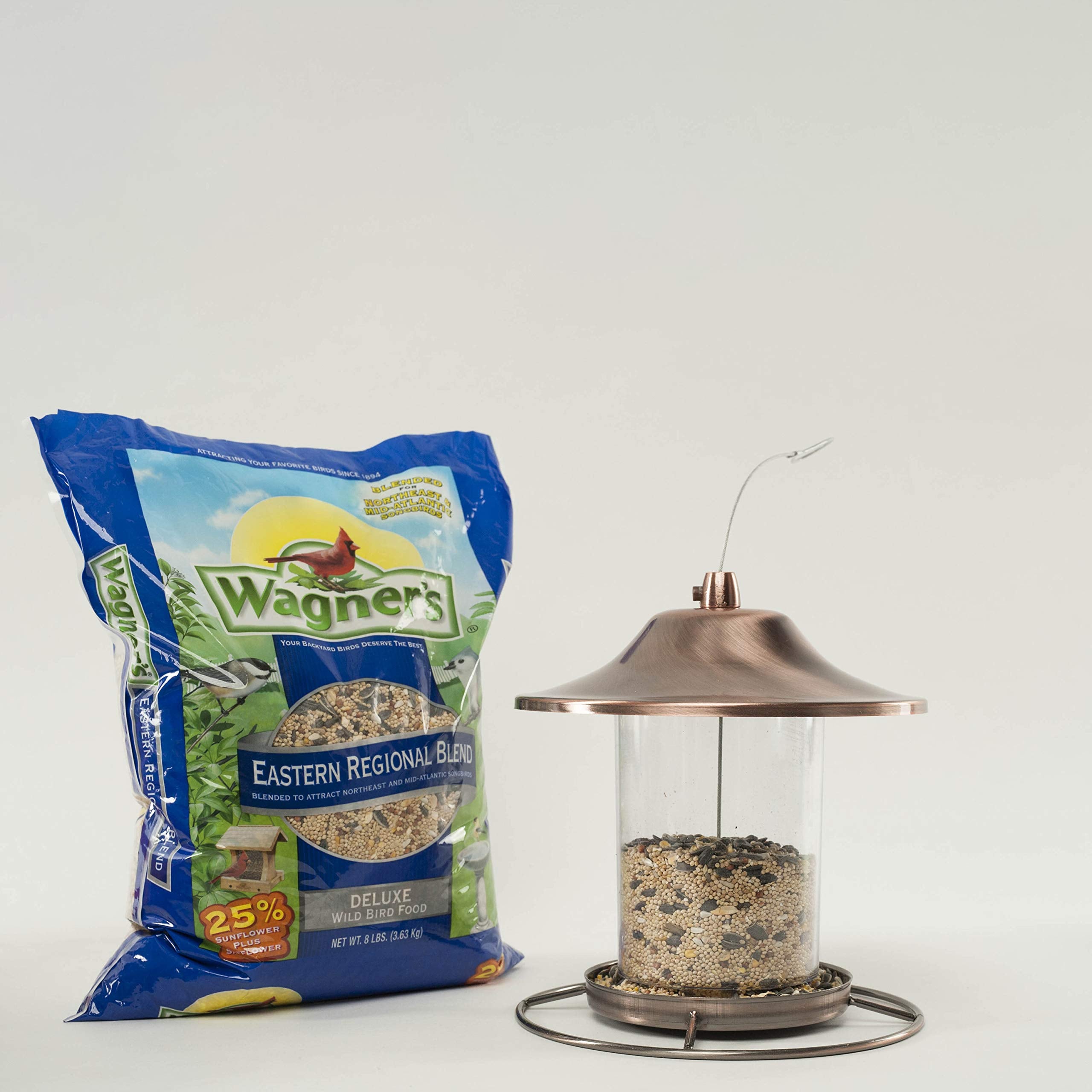 Wagner's Eastern Regional Blend Wild Bird Food with birds feeding in background