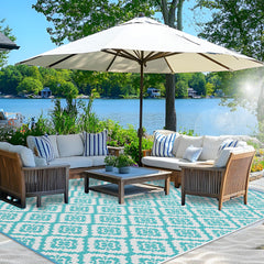 Wallona Outdoor Rug 8x10 ft in Brick Teal and White front view