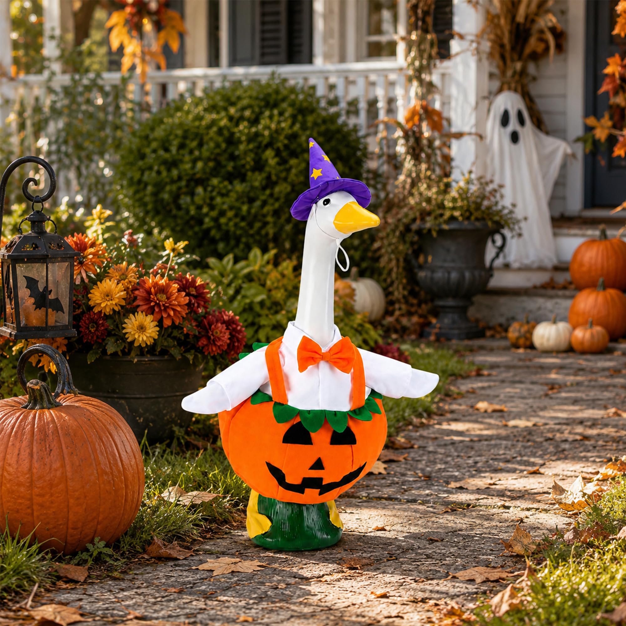 Watayo Pumpkin Goose Outfits displayed on a porch goose statue