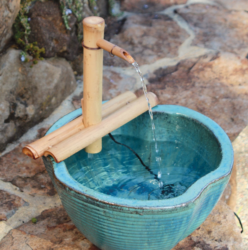 Water flowing from the bamboo fountain
