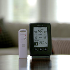 Weather station showing moon phase and barometric pressure