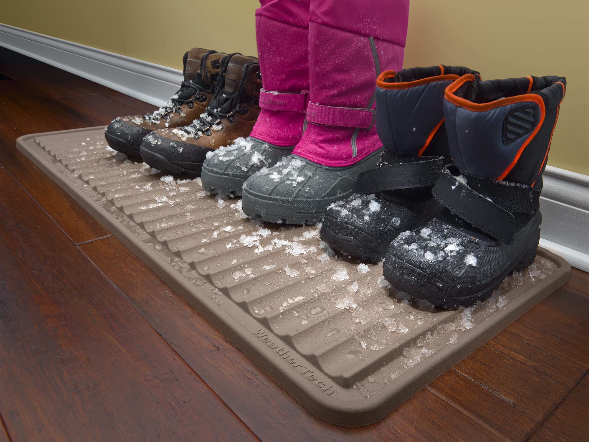 WeatherTech BootTray 16x36 brown mat with dirt
