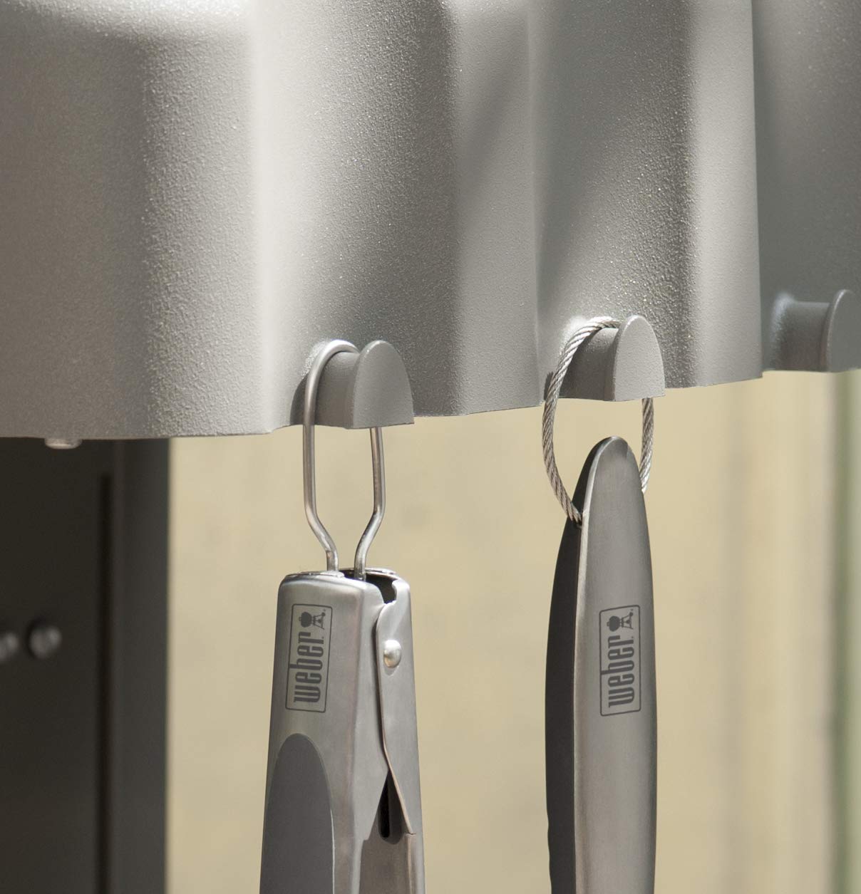 Weber 2-Piece Barbecue Tool Set displayed on a grill