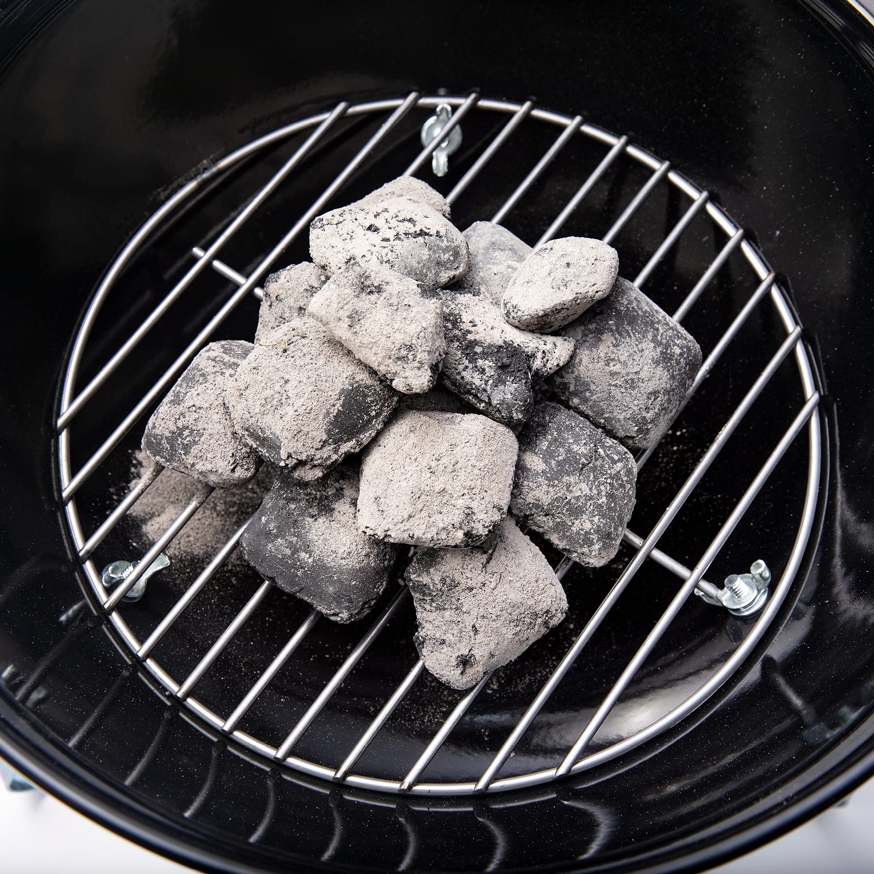 Weber charcoal grate side view showing heavy-duty steel