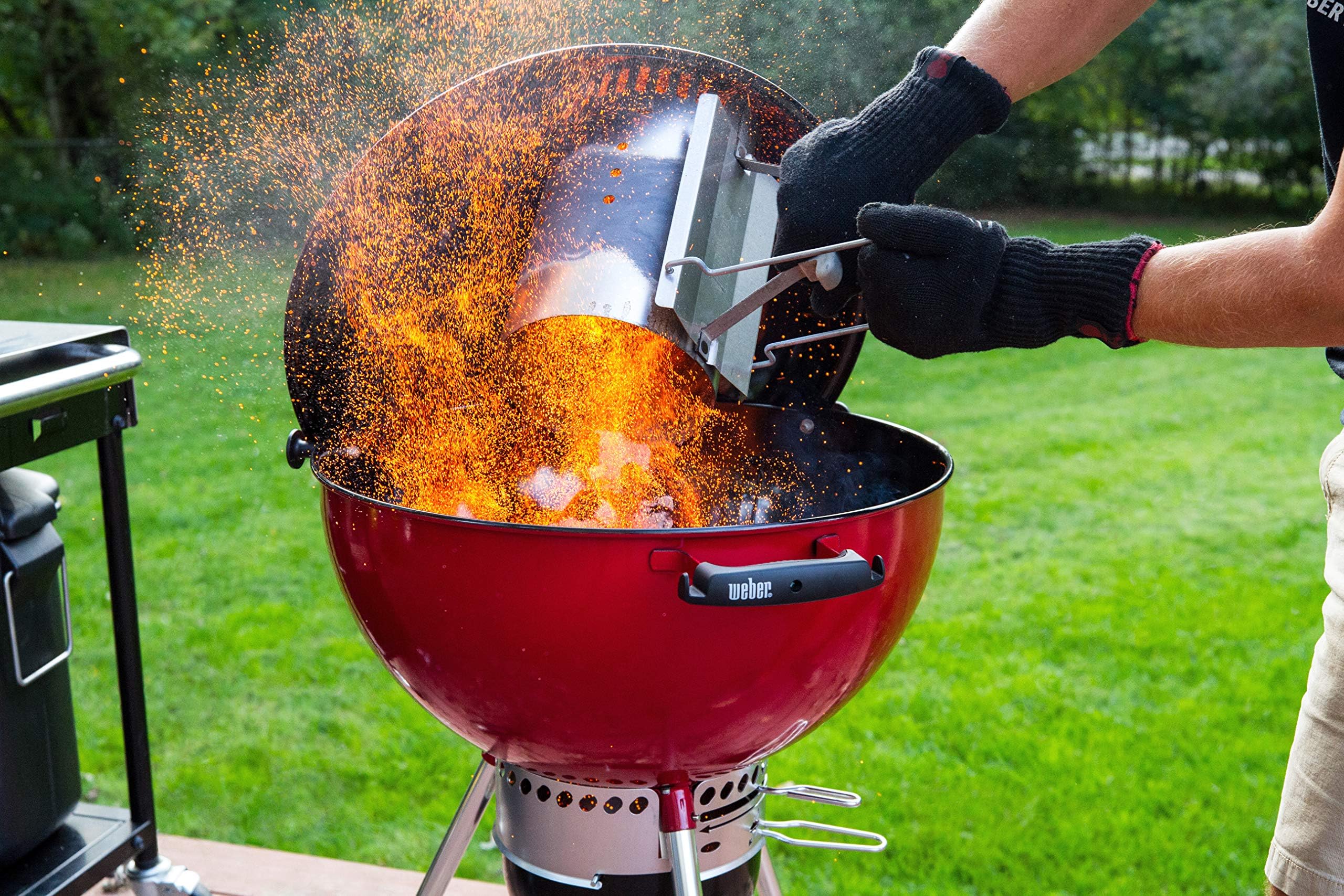 Weber Charcoal Lighter Cubes being lit outdoors