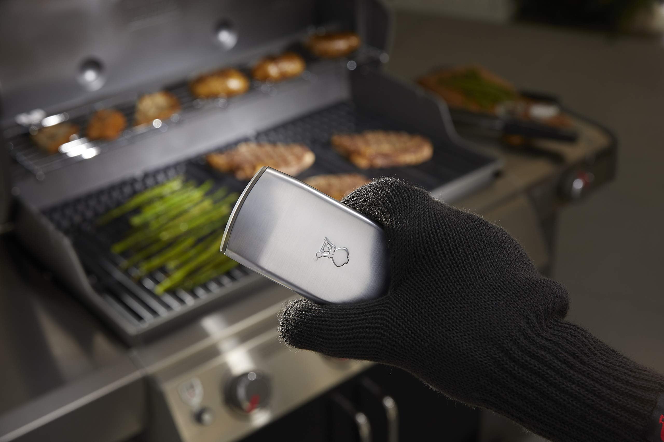 Weber Grill ’N Go Light displayed with grill models