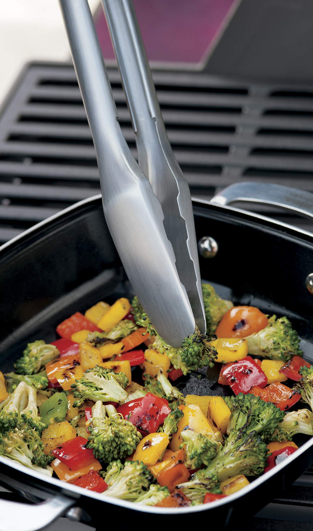 Weber tongs with ergonomic design for better grip