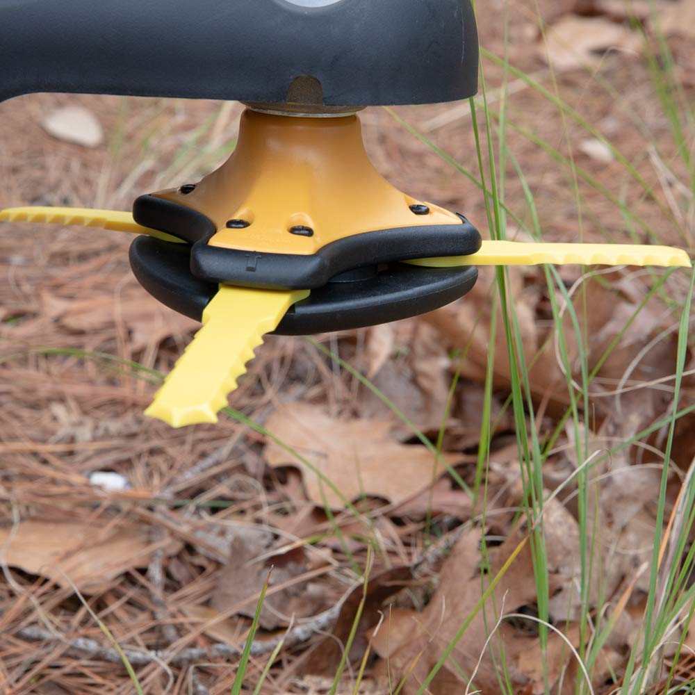 WEED WARRIOR trimmer head next to a gas trimmer