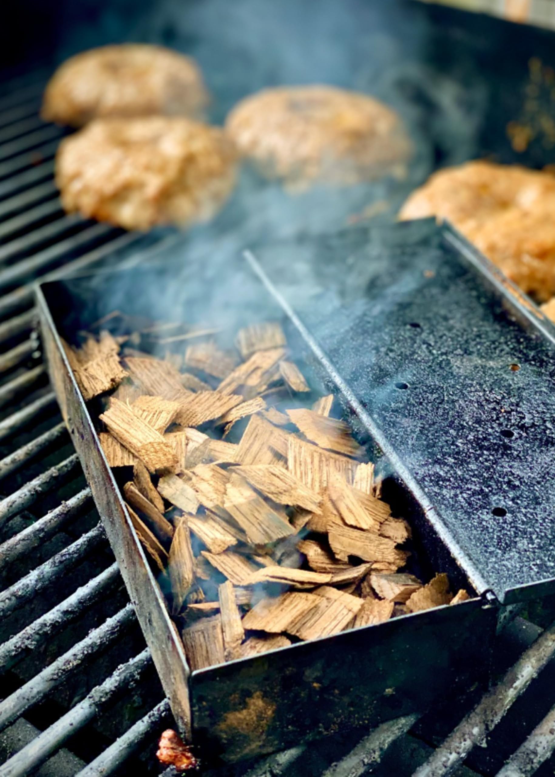 Western Cherry BBQ Smoking Chips in a grill setup