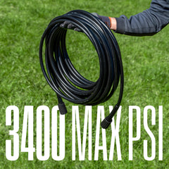 Westinghouse pressure washer hose in use, cleaning a patio