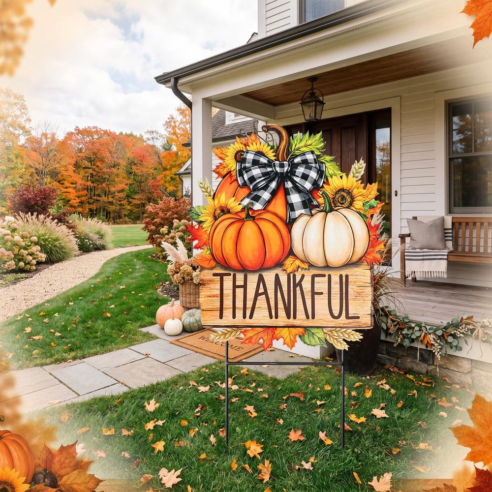 Weysat Pumpkin Sign beside autumn flowers in a garden