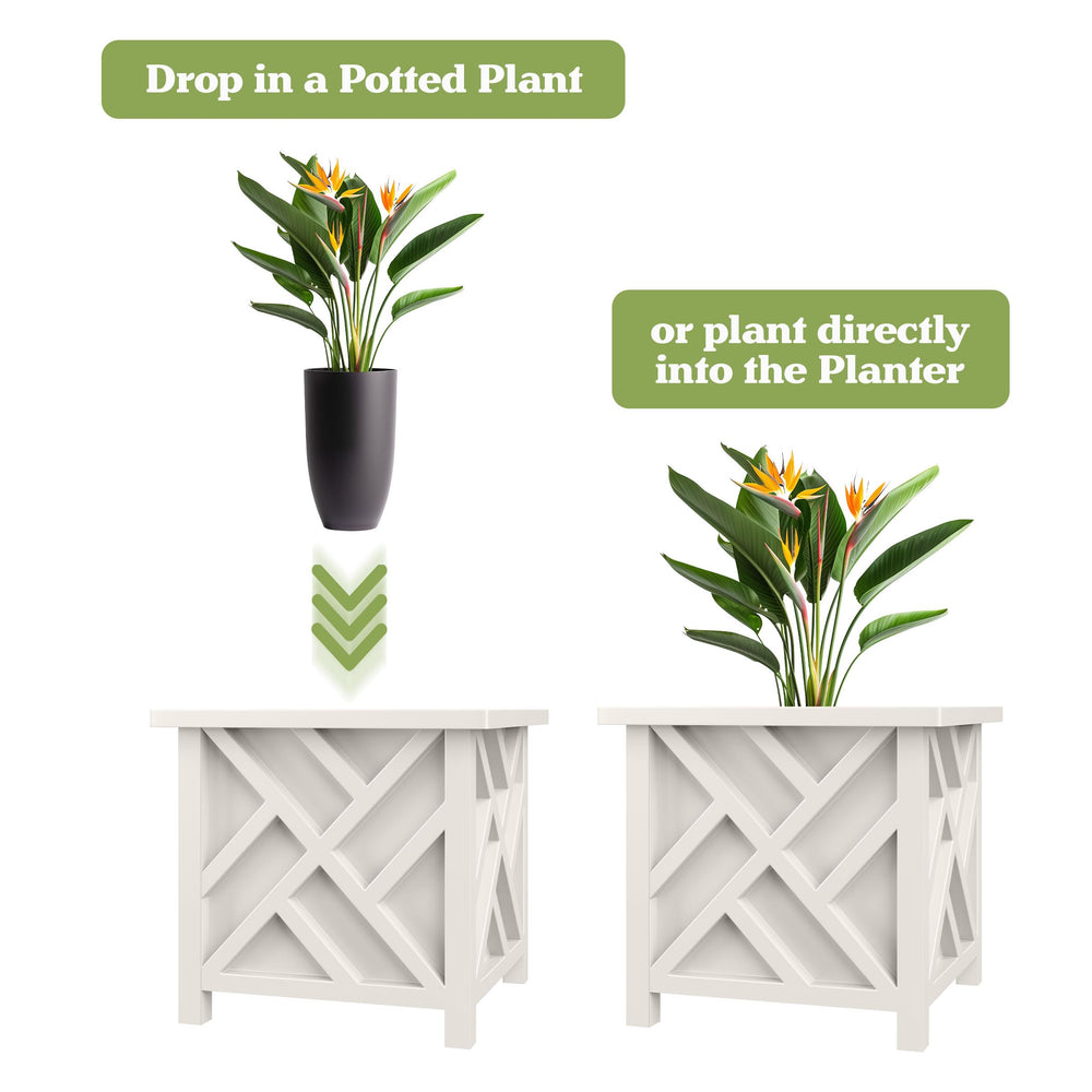 White outdoor planter box with flowers in a garden