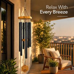 Wind chimes hanging in a garden setting