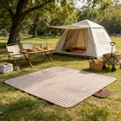 Wind Tour Picnic Blanket folded with carry strap for easy transport