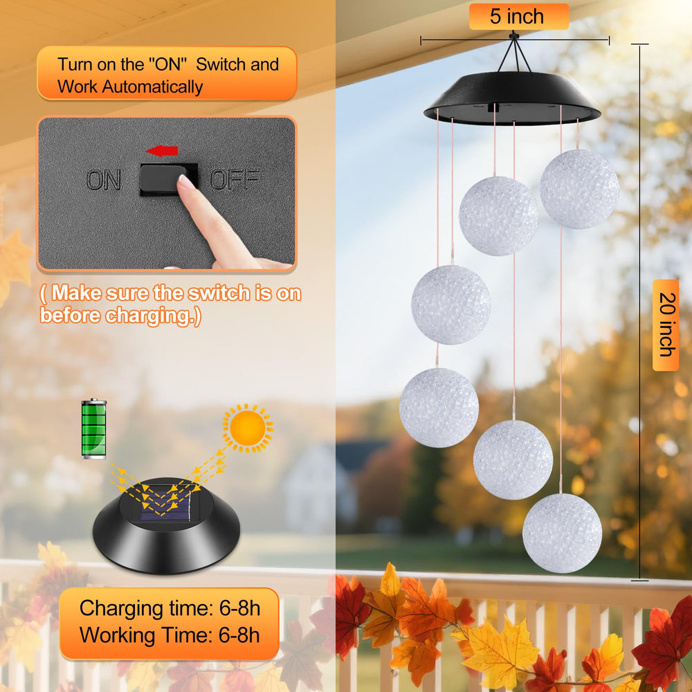 Winzwon Solar Wind Chimes hanging on a fence in a garden