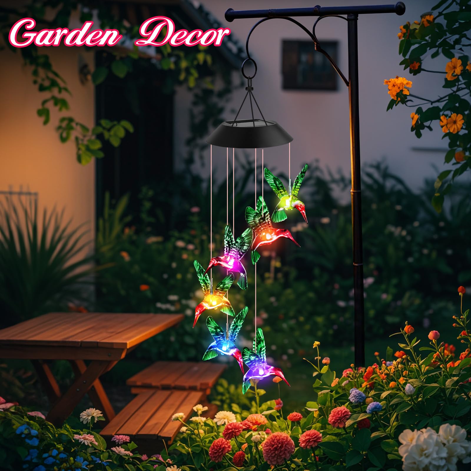 Winzwon Solar Wind Chimes hanging on a tree in the garden