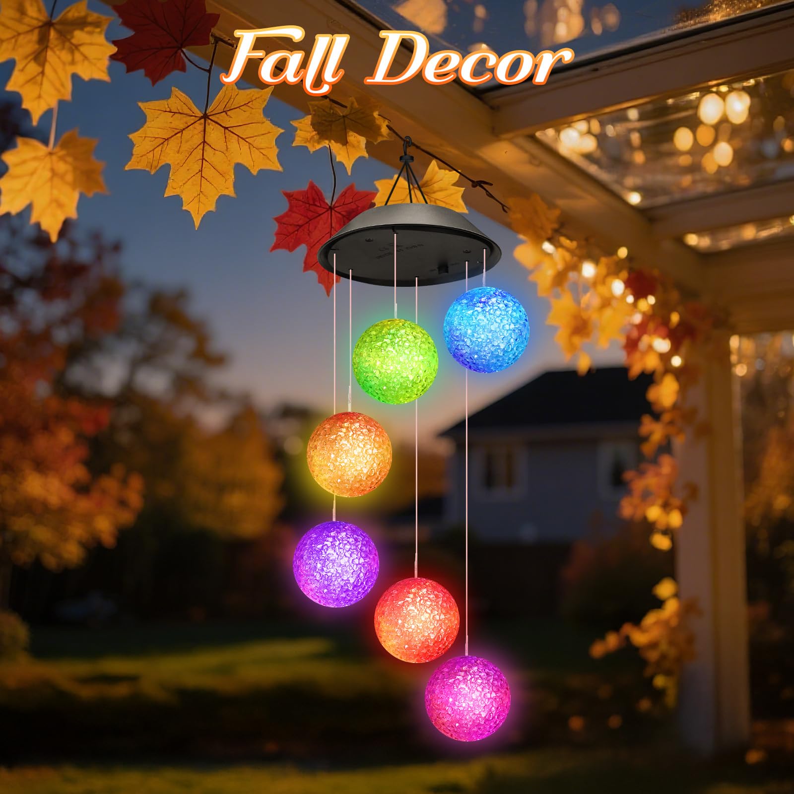 Winzwon Solar Wind Chimes hanging on a tree with evening glow