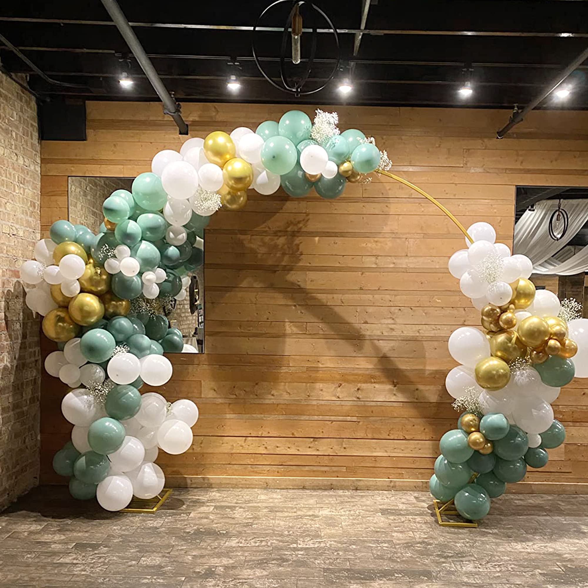 Wokceer 9.2 FT Gold Balloon Arch Stand in a garden setting