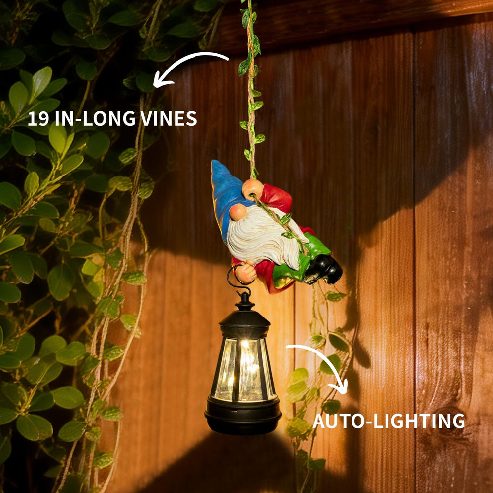 WONDHOME gnome hanging from tree branch with lantern glowing