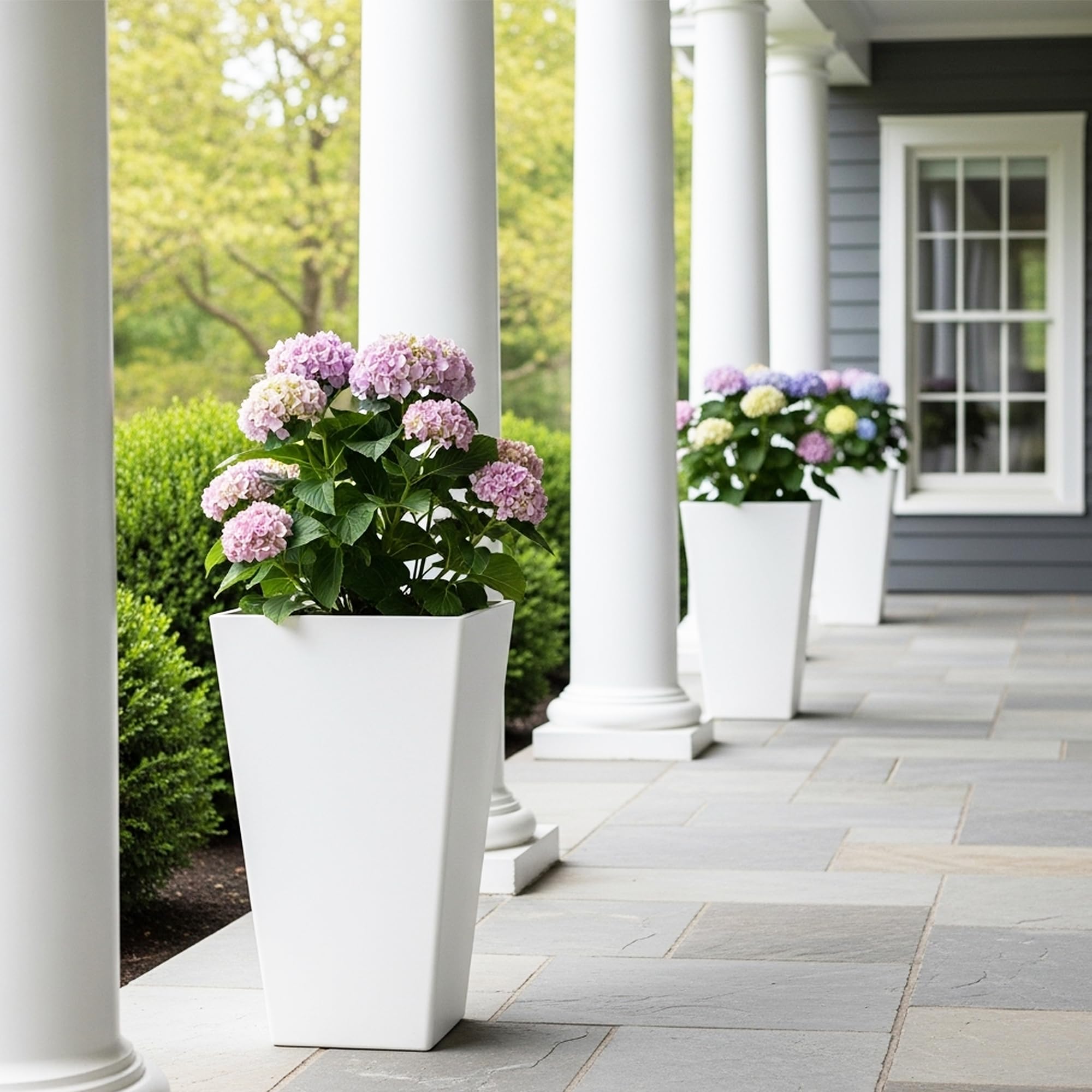 Worth Garden 20-inch white planter with medium-sized plant
