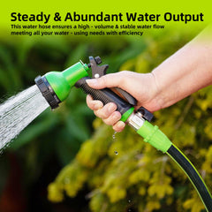Worth garden hose in use watering a garden