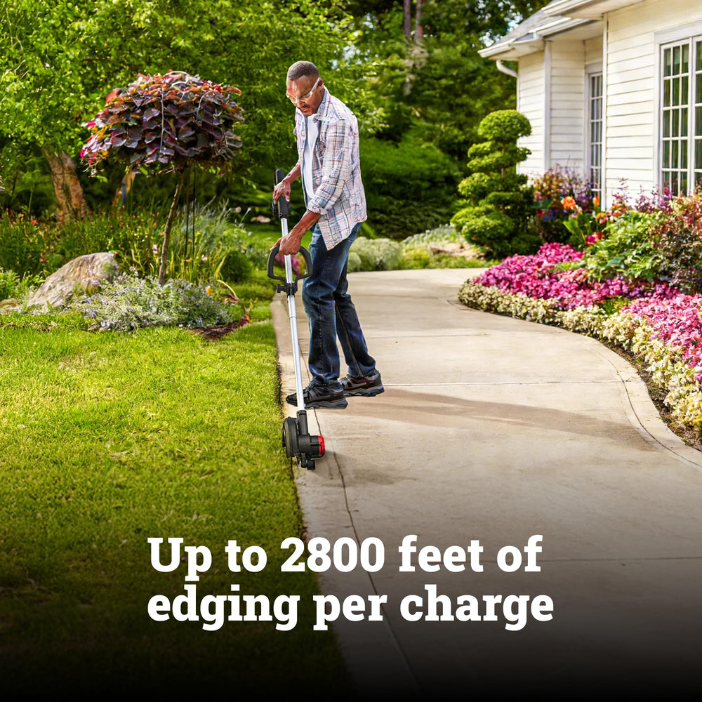 WORX edger in use along a sidewalk