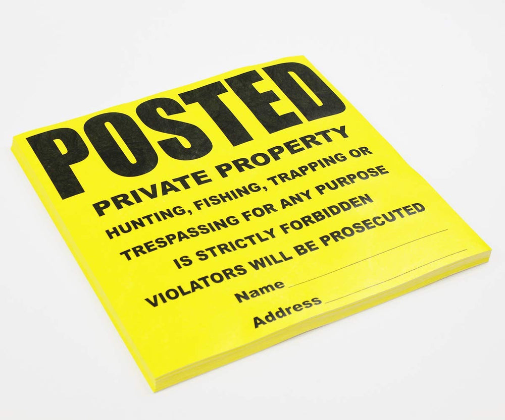 Wristco signs displayed outdoors in a garden