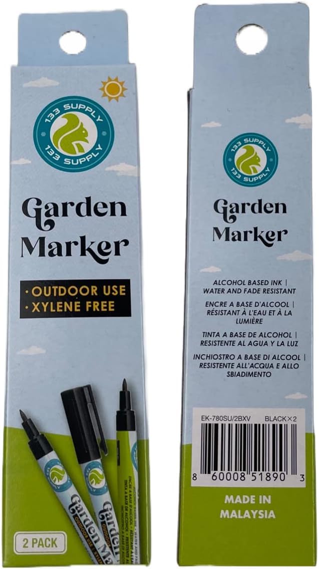 Writing on a T-Type plant label with a garden marker pen