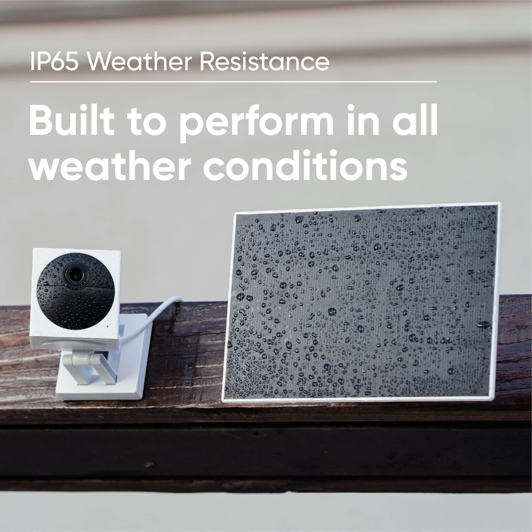 WYZE Solar Panel installed outdoors next to Wyze Cam Outdoor
