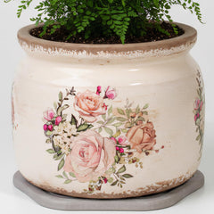 Xiaan Jiaju pink ceramic plant pot front view with decorative saucer