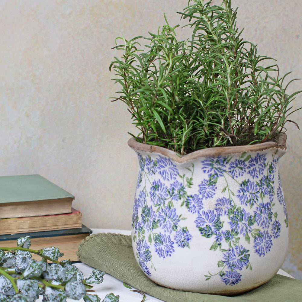Xiaan Jiaju Vintage Ceramic Plant Pot on a wooden table