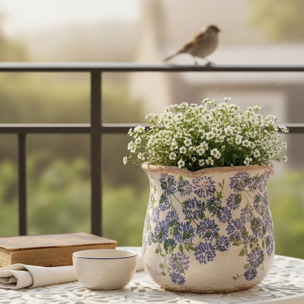 Xiaan Jiaju Vintage Ceramic Plant Pot with plant in a cozy indoor setting