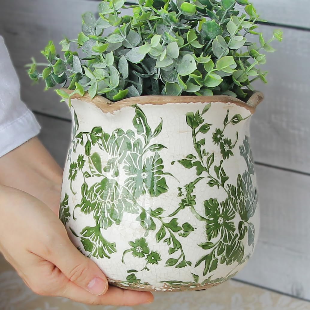 Xiaan Jiaju Vintage Plant Pot on a table with flowers