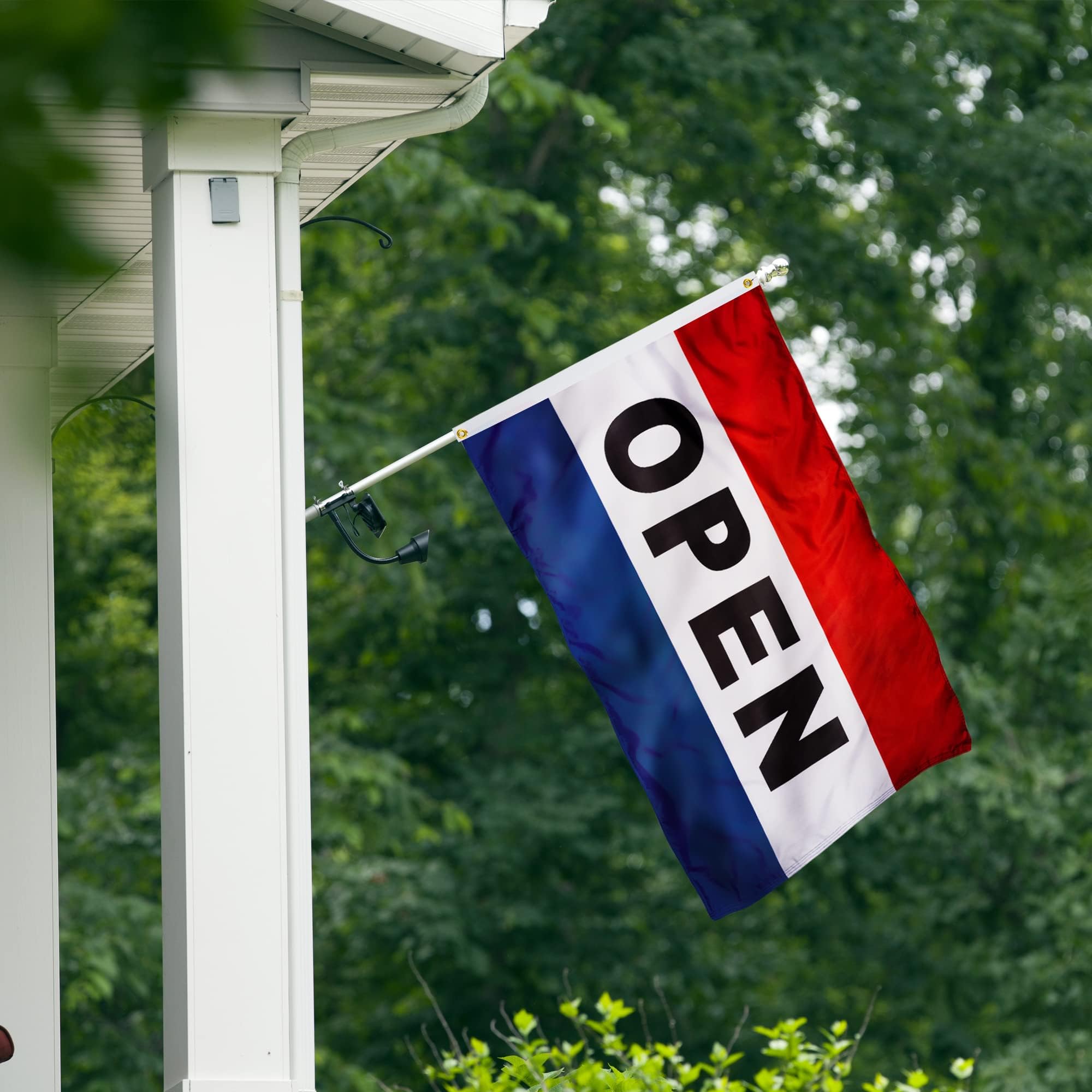 XIFAN Open Flag displayed outside a small business