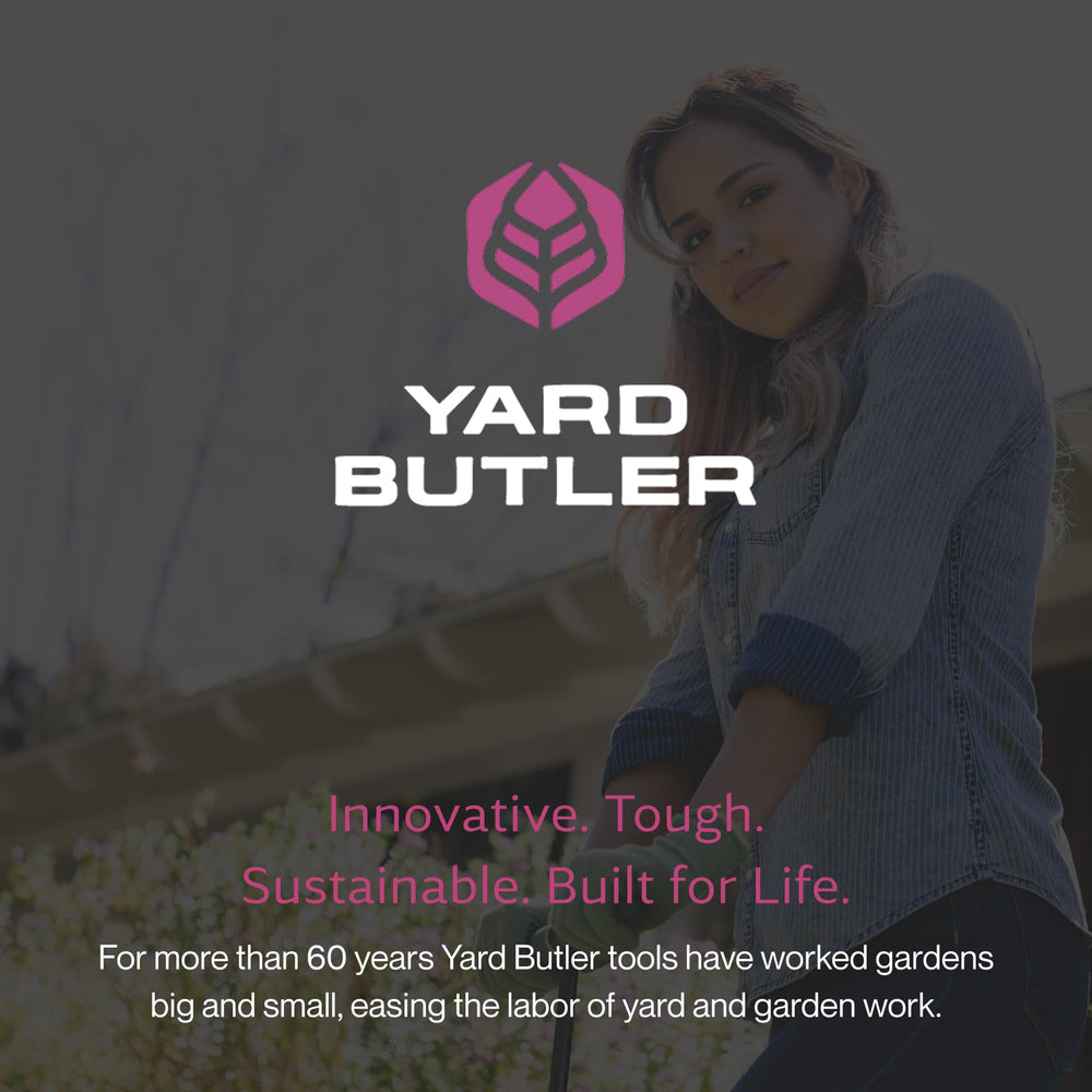 Yard Butler aerator in use on a green lawn