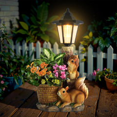 YEPOTUE Solar Squirrels Outdoor Statue front view with lantern