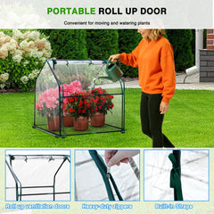 Yesker Mini Greenhouse setup in a garden with various plants