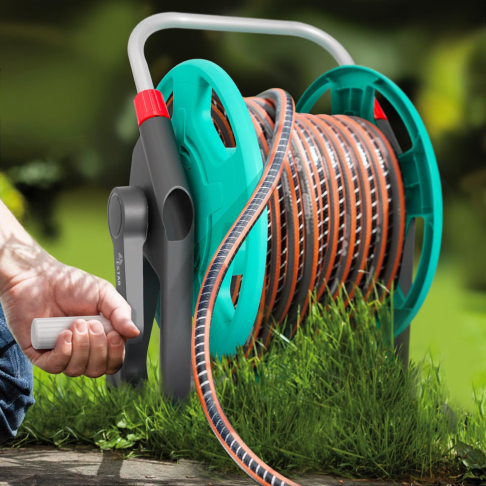 YESTAR hose reel in storage with organized garden tools