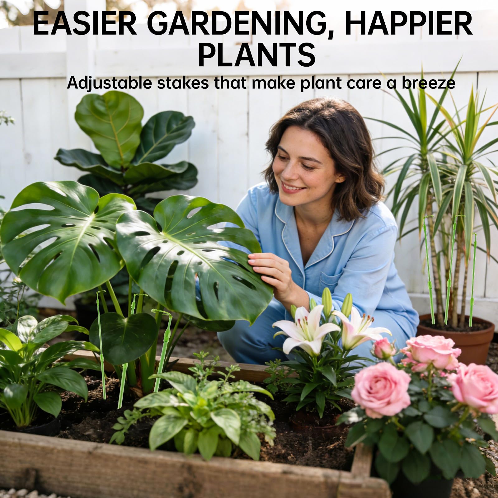Yhtpouqe 6 Pack Extendable Plant Stakes with green finish in a garden setting