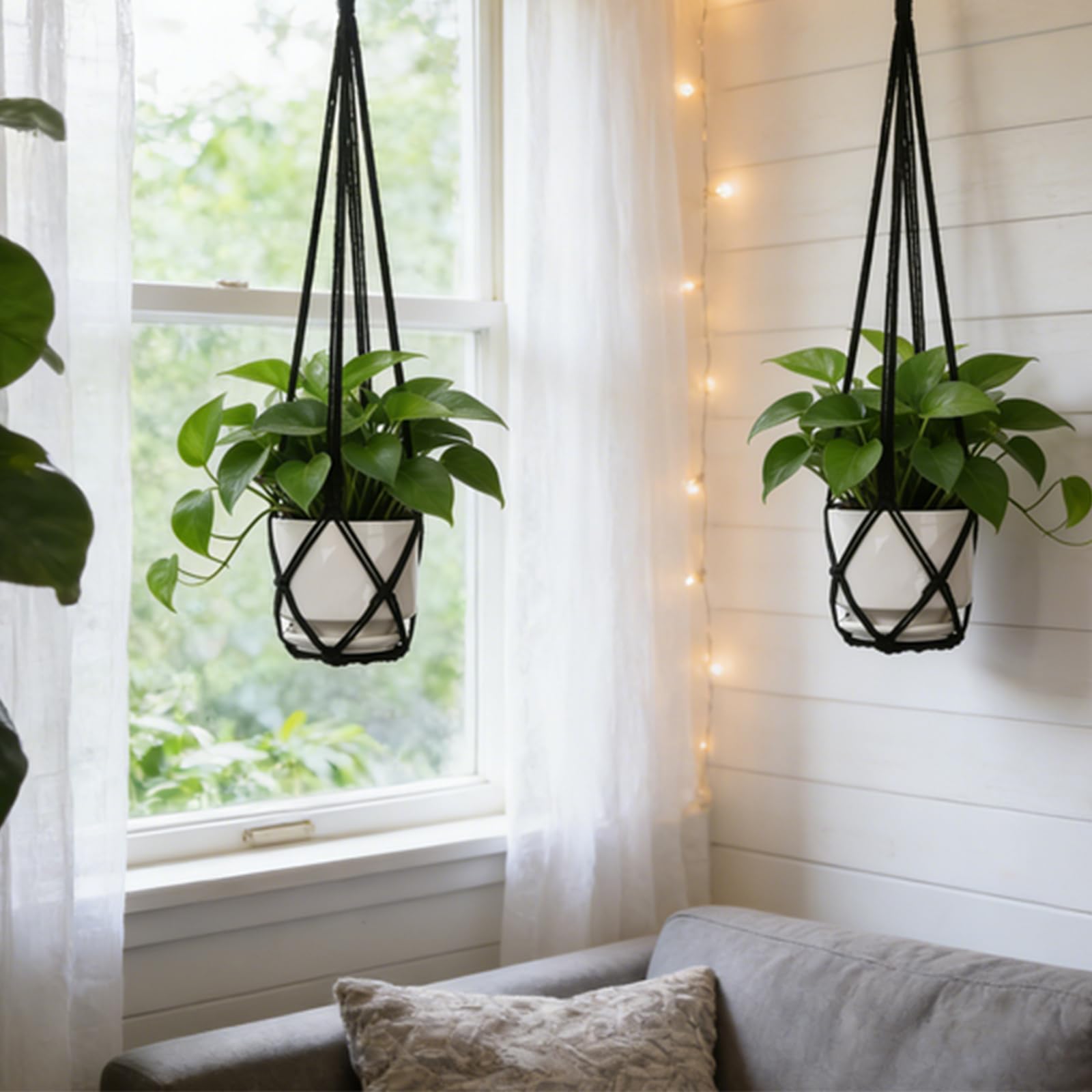 YIBOT Macrame Plant Hanger 35 Inch Black in a modern living room