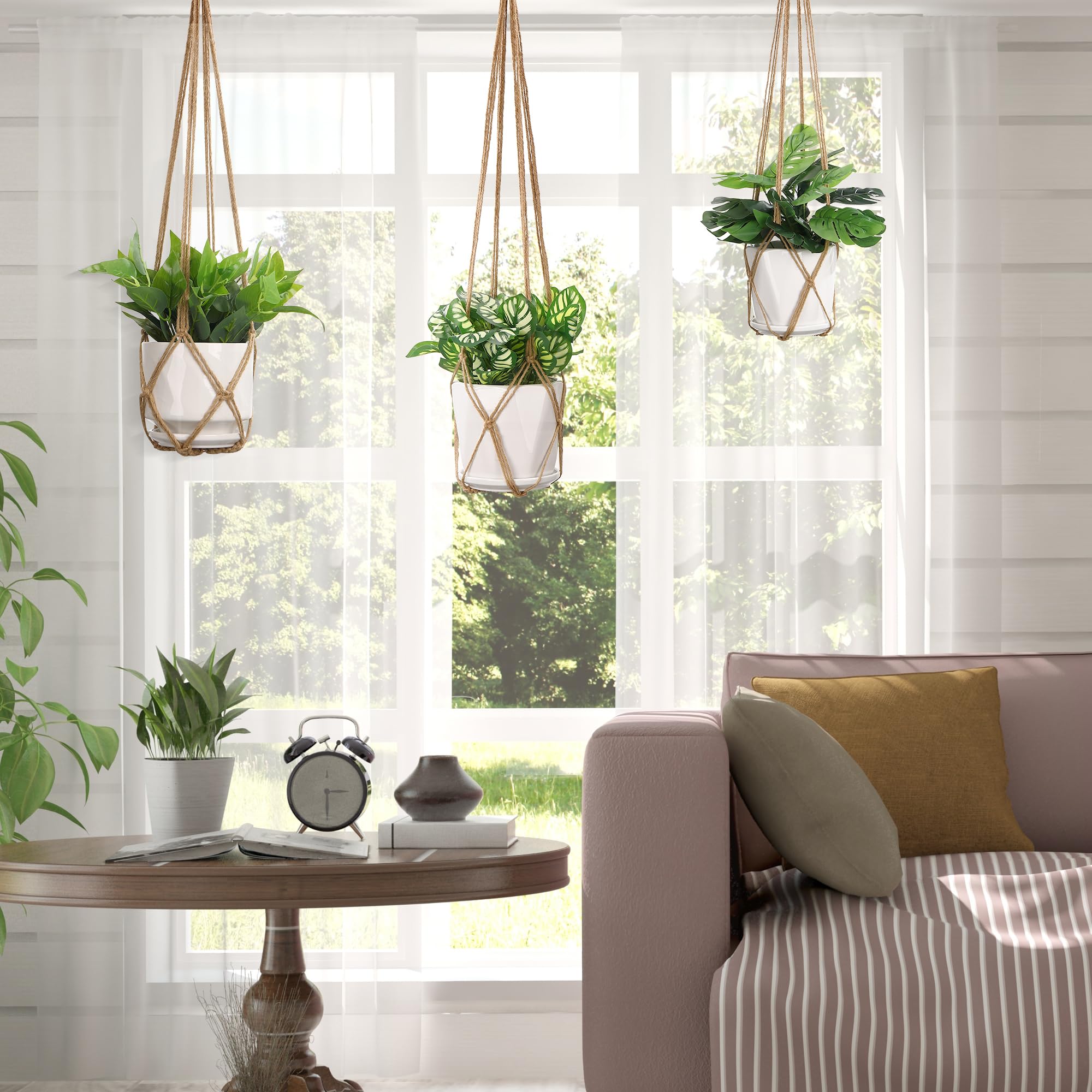 YIBOT macrame plant hanger hanging from a balcony