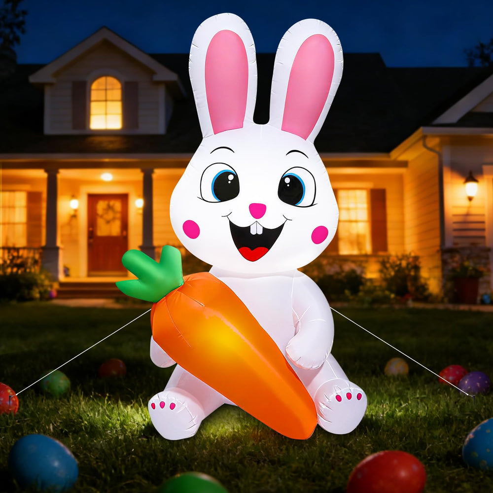 Yichuke 5 Ft Easter Bunny inflatable with carrot, illuminated at night