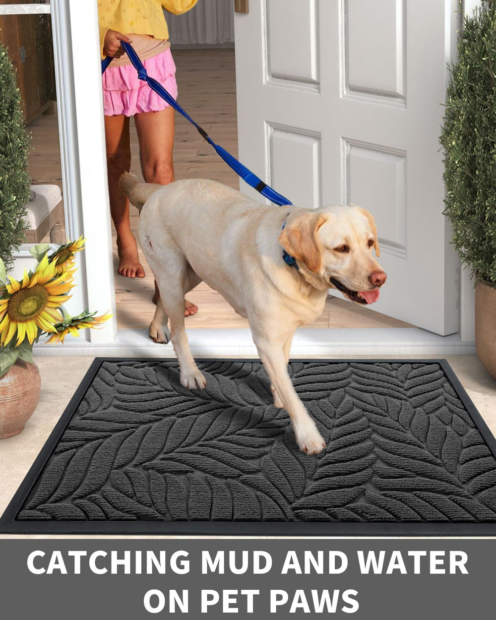 Yimobra Leaf Pattern Door Mat being cleaned with garden hose